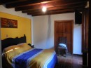 Our room, walls 3 feet thick and big wooden ceiling beams.