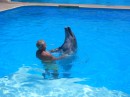 Ian dancing with the dolphin.