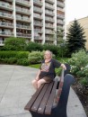 Linda in front of her new apartment building in Toronto.