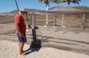 Ian looking at the turtle egg nests which are fenced to protect from predators.