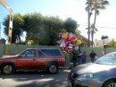 Balloon vendor for Valentines day out of the back of his truck.