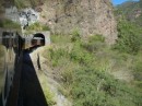 The El Chepe train to the Copper Canyon going into one of about 30 tunnels on this ride.