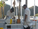 Purto Escondido - marina potluck a guy making Denny a rum & coke for twenty pesos