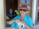 Vicki with a tame Red Lored Amazon parrot in Bocas Town