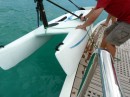 Lowering the Hobie into the water
