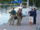 Mike chatting with the Navy personnel about the Jamaican yacht