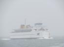 Ferry appearing out of the fog: Near Orient, New York.