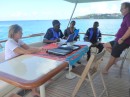 Sitting on the aft deck with our new friends, the Water Police in Montego Bay.