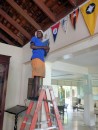 Striking a pose while hanging our RQYS Burgee in the Montego Bay Yacht Club, Jamaica.  If anyone arrives at the Club by sea, please take a picture and send to us.  We