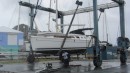 Hauled out and moving to the boat yard