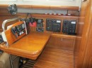The nav station is configured with an ergonomic seat and chart table with lots of storage for those miscellaneous items as well as chart supplies.  All the DC and AC breaker controls are centrally located along with the tank level monitor.  