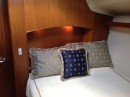 The private guest suite includes a full size innerspring mattress with custom bedding. 