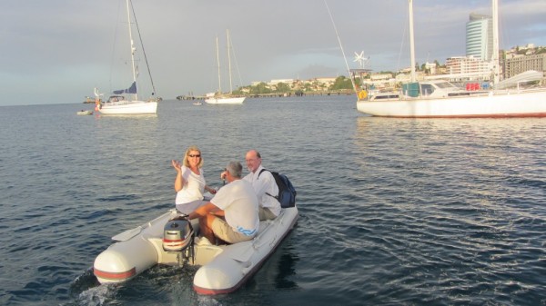 Here the Four Winds PVC inflatable dinghy easily moves through the harbor with the 4 HP Mariner engine.