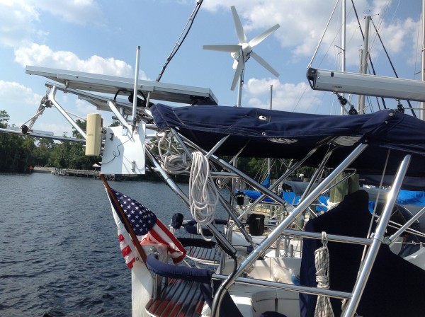 As seen in this picture, Koinonia II is outfitted with 250 watts of solar panels, a D400 wind turbine, and a wifi antennae for picking up those shore hotspots from miles away.  Included is a stern mounted American flag.  Koinonia II is a US documented vessel!