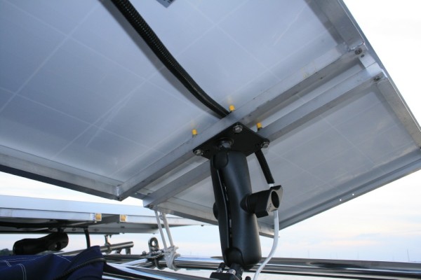 Shown here is one of the solar panels tilting to the sun using the Ram Mount system for ease of tracking the sun.