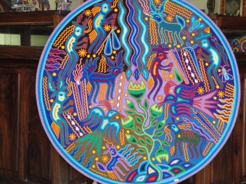 The Huichol indians make fabulous art works with beads pressed into wax.