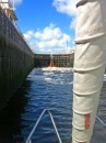 The St. Lucie Lock with the colorful Lake Okeechobee water lifting us up.