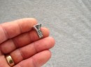 This is the offending screw that caused the mainsail to hang up, all that drama one small screw, its the little things and the details that the sea will find and expose all weakness. 