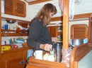 Linda organizing her galley for sea.