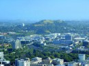 Auckland is built atop numerous volcanic cones  - which are not necessarily extinct -one of which can be seen in the distance here. How