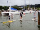 Paddle boarding is very popular in New Zealand; here some paddle board racers head downriver past Bright Angel.
