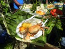 A tempting plate of fresh cooked crab, box fish, paw paw (papaya) and bundi - a banana-like fruit. Delicious!