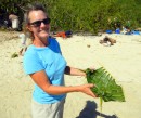 Cyndi shows off a palm frond serving piece.