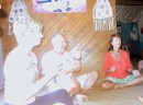 (With apologies for the poor quality of this photo) - Eva (one of the guests of honor), from "Rotor," and John and Sandy ("Tiger") cobo after someone finished a bilo of kava.
