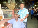 Father and son at their stall in the Labasa market.