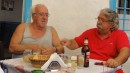 Two wonderful greek men arguing at lunch