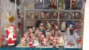 Display of Santas at the market.