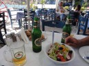 The obligatory greek salad (no feta cheese, please) and a cold Mythos ...