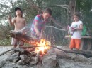 Three pyromaniacs roasting marshmallows at the Australia Day bonfire.