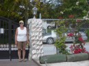 see I am here...conch shells beside me in gate post...