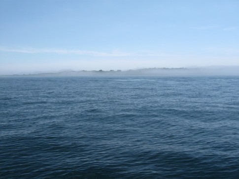 Fog lifting off Block Island 