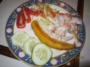 Shellfish medly with Plantains, cole slaw, tomatoes & cucumber