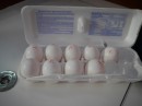 Eggs here are very bright  white. Do chickens lay different egg colour in different countries?