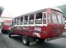 One of the many privately owned community buses constructed by modifying a pick-up truck chassis.  