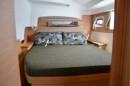Guest cabin in the aft port hull also has the same size queen berth as the master, and includes an ensuite head.