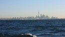 Toronto from 5 nm off shore about 8:00 am on a hazy morning.