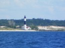Zoomed in as much as I could to get the lighthouse on the shore between Pentwater and Portage Lake