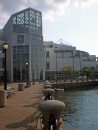 Our dingy is tied next to ladder in front of the Great Lakes Science Center which is right next to......