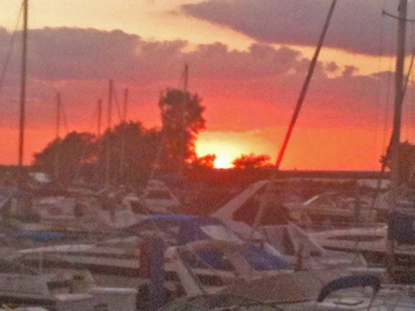 Stink-pots in Whiskey River Marina at sunset.
