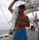 Jeff with a bonito - our fish go at strip bait, it helped us catch our tuna