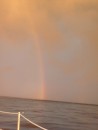 Rainbow after a down pour in the stone jetty