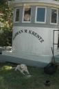 Madison finds a shady spot in front of the pilot house from the Herman M. Krentz skipjack.