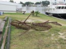 We photographed a fisherman tonging for oysters on the bay and spotted these tongs in the yard at the Deltaville Marina.