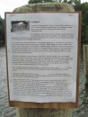 A sign on the Holly Point dock explains how the crabpot, invented in the 1920s, works.