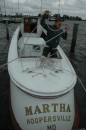 Jennifer Kuhn secures lines in Martha