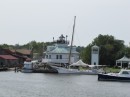 A view of the Hooper Strait Lighthouse on the Chesapeake Bay Maritime Museum campus from the water. 
